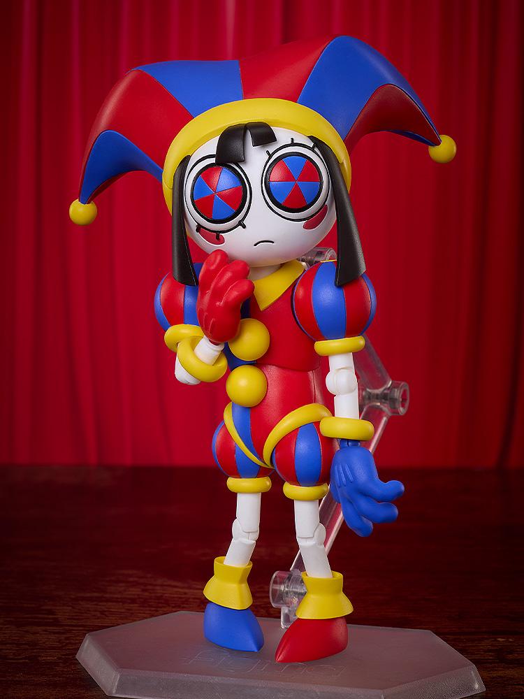Studio shot of the Pomni figma jester figure standing against a red background, bringing a red gloved hand to her mouth with an anxious expression.