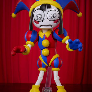 The Amazing Digital Circus Pomni figma figure utilizing her unique glitched face plate option featuring black abstract scribble eyes.