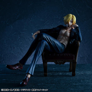Eye-level front shot of Portrait.Of.Pirates S.O.C. Sanji Ver.R reissue figure lounging in armchair under dramatic lighting.