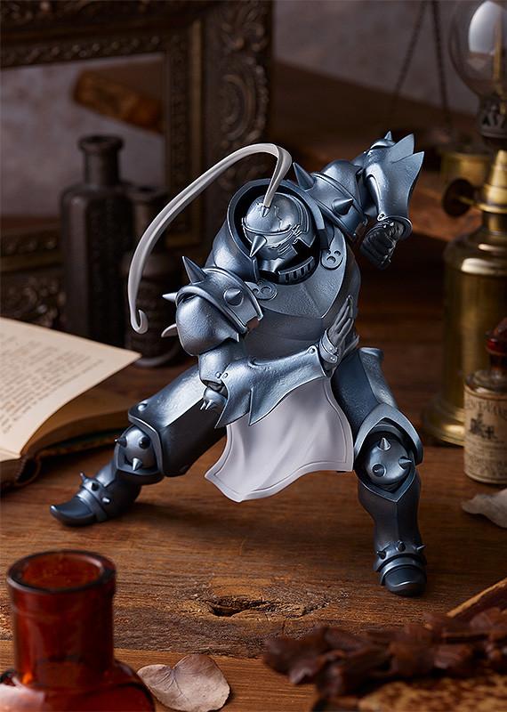 High-angle cinematic shot of the Alphonse Elric figure highlighting the realistic metallic texture and weathering of the silver armor.