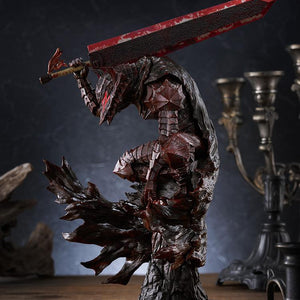 Full profile shot of Pop Up Parade L Berserk Guts figure in bloody paint version set against dark atmospheric background