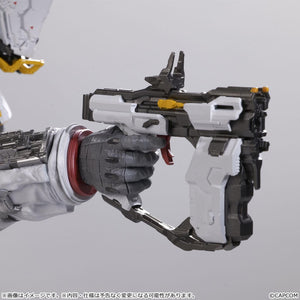 Macro view of the armored gray glove holding the white and gray sci-fi pistol weapon from the Capcom Pragmata figure line, highlighting the mechanical trigger and sight rails.