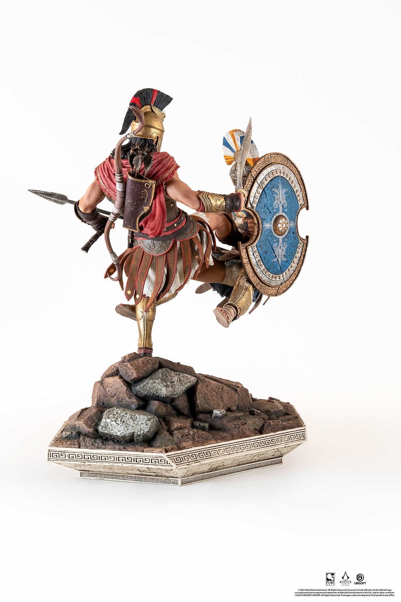 Rear-side view of the diorama, focusing on Alexios' powerful leg and the detail of the Athenian soldier's blue shield.