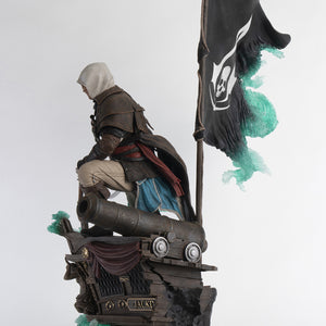 A clean side view of the Animus Edward Kenway statue, highlighting the silhouette of the character, the cannon, and the pirate flag.