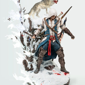 A full-body frontal shot of the Animus Connor statue, highlighting the LED-lit Animus effect and the detailed sculpt of Connor, the wolf, and the snowy terrain.