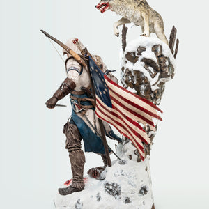 A full side-profile view of the Animus Connor statue, showing Connor, the wolf, and the tattered American flag in one shot.