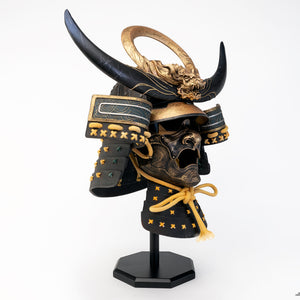 Right side angle of PureArts Assassin’s Creed Yasuke Samurai Helmet life-size replica showcasing detailed mask, horns, and golden accents.