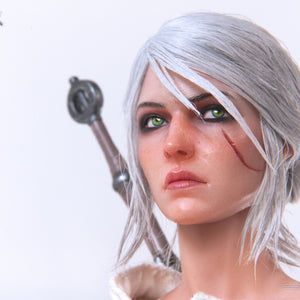 Close-up portrait of the Ciri articulated figure, capturing a serious and determined expression.