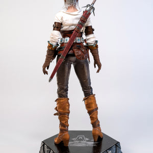 Full rear view of the Ciri figure, focusing on the detail of the sword sheath and her signature brown leather boots.