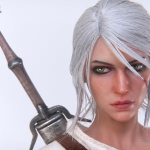 Close-up of Ciri's face, focusing on her lifelike expression and the hilt of the metal Zireael sword.
