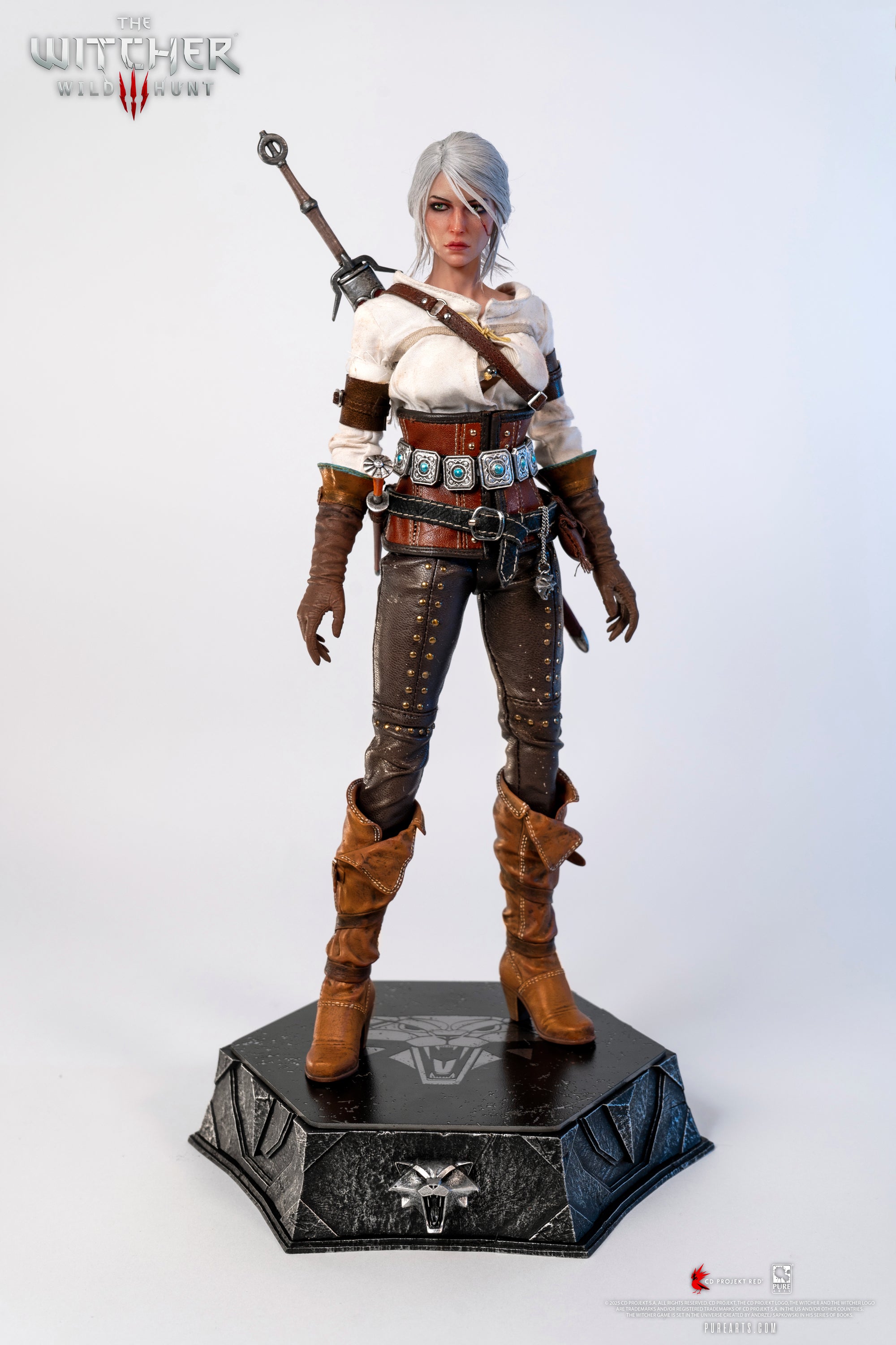 Full frontal view of the PureArts Ciri 1/6 Scale Articulated Figure, displaying her leather outfit and silver sword sheath on a Witcher base.