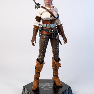 Full frontal view of the PureArts Ciri 1/6 Scale Articulated Figure, displaying her leather outfit and silver sword sheath on a Witcher base.