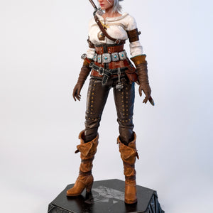 Front view of the Ciri figure, highlighting the realistic tailoring of her clothing and the turquoise jeweled belt.