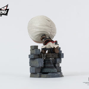 Back-left angle of the PureArts Qlectors Altaïr figure, capturing the details of his backpack and the fabric folds on his robes as he stands on the bell tower base.