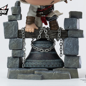 A detailed close-up of the bell tower base of the PureArts Qlectors Altaïr figure, showing the sculpted stone texture, the metal chains, and the ornate bronze bell below.