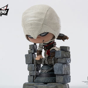 A dynamic front-right view of the PureArts Qlectors Altaïr figure, capturing his pose on the bell tower with his hand on the chained wooden beam.