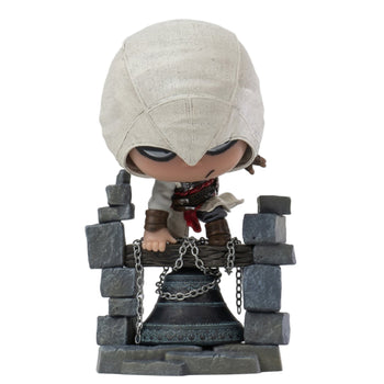 Front view of the PureArts Qlectors figure featuring Altaïr perched on a detailed bell tower base, showcasing his full body and iconic hooded look.