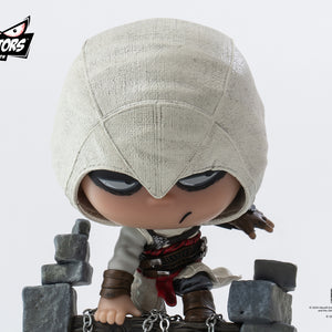 A close-up shot of the head and torso of the PureArts Qlectors Altaïr figure, highlighting his iconic hood, mask-like facial features, and the sculpted details of his armor and clothing.