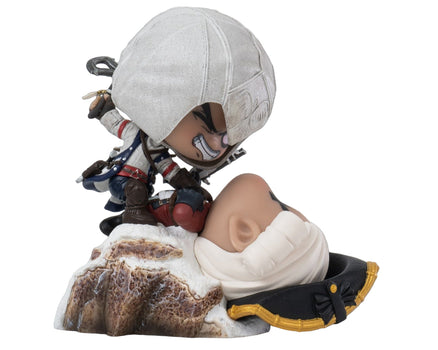 Side view of the PureArts Qlectors Connor Kenway figure, showing him in a dynamic pose over a defeated British soldier on a snow-covered base.