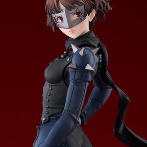 A close-up shot of the Queen figure's face, showing her red eyes, iron mask, and the detailed spikes on her shoulder armor.
