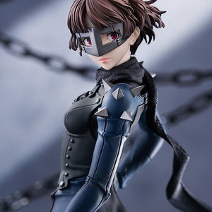 Detailed close-up of the Queen figure in an industrial setting, focusing on the character's intense expression and the high-quality sculpt of her hair.