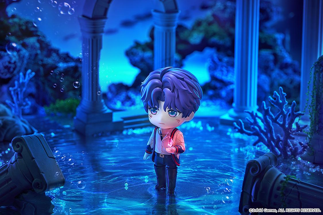 Rafayel Nendoroid figure standing in a submerged blue ruins diorama with a small glowing pink flame effect in his hand.