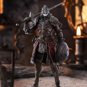 Atmospheric promotional diorama shot of the Elden Ring Raging Wolf figma standing inside a stone castle chamber backdrop next to a lit candelabra.