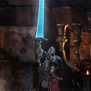 Full shot of the Raging Wolf action figure raising the glowing blue translucent Dark Moon Greatsword high above his head with both hands in a smoky, candlelit stone chamber.