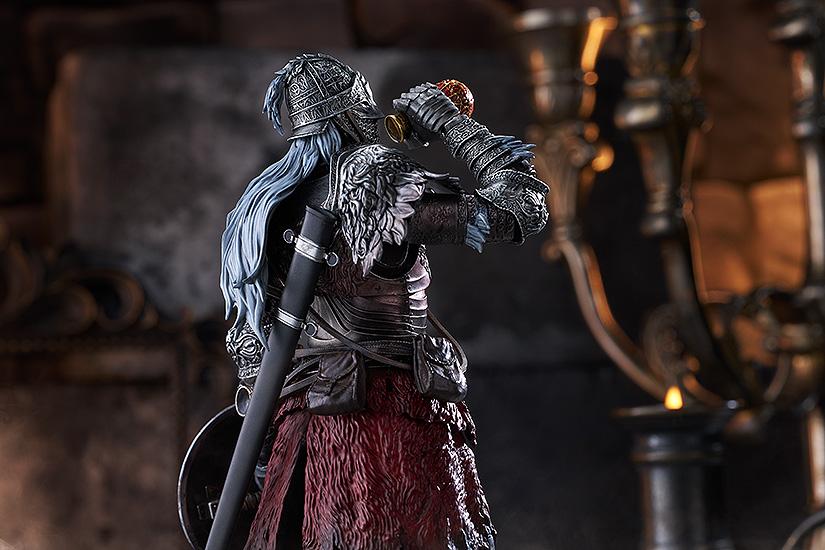 Rear three-quarter view of the faging Wolf figure tilting his helmeted head back to drink from the gold and red Flask of Crimson Tears accessory.