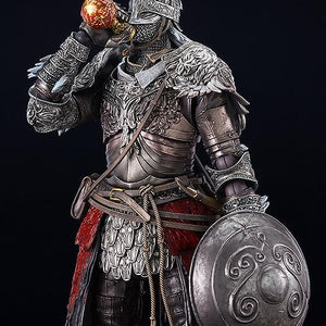 Close-up front view of the figma Raging Wolf figure posing as if drinking from the round, ornate gold and red Flask of Crimson Tears item.