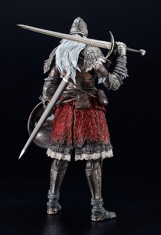 Full-body rear view of the Raging Wolf figma figure on a black background, highlighting the silver hair, detailed cape armor, and red fabric skirt accents.