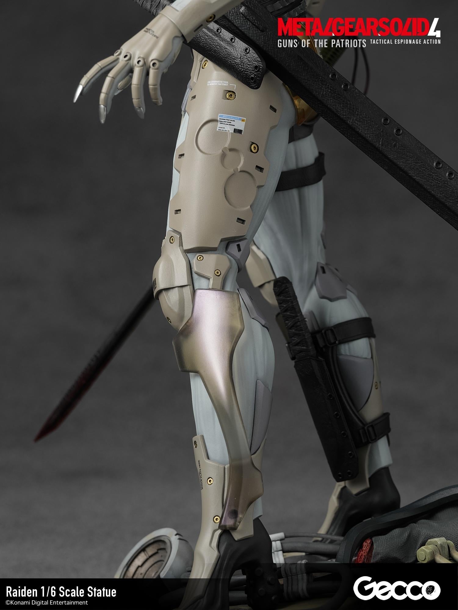 Close-up of the mechanical leg armor and intricate joint details on the 1/6 scale Raiden statue.