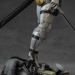 Detailed view of the lower torso and legs standing on the scattered remains of a defeated Gekko.