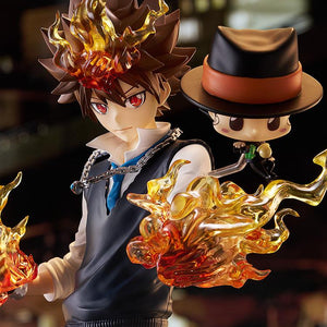 Dramatic waist-up close-up of Tsunayoshi Sawada and Reborn under cinematic night lighting, showcasing his red eyes and fiery fists.
