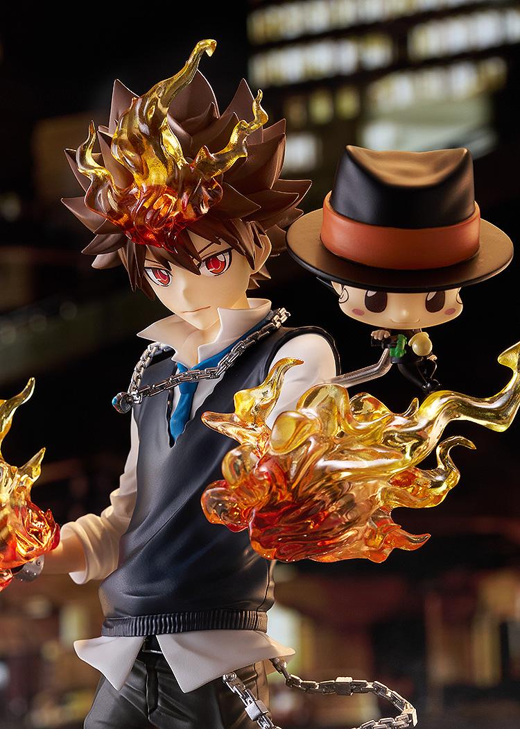 Dramatic waist-up close-up of Tsunayoshi Sawada and Reborn under cinematic night lighting, showcasing his red eyes and fiery fists.