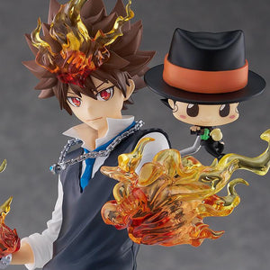 Close-up upper-body shot of Tsunayoshi Sawada with translucent flame effects around his fists, accompanied by Reborn wearing his fedora hat.