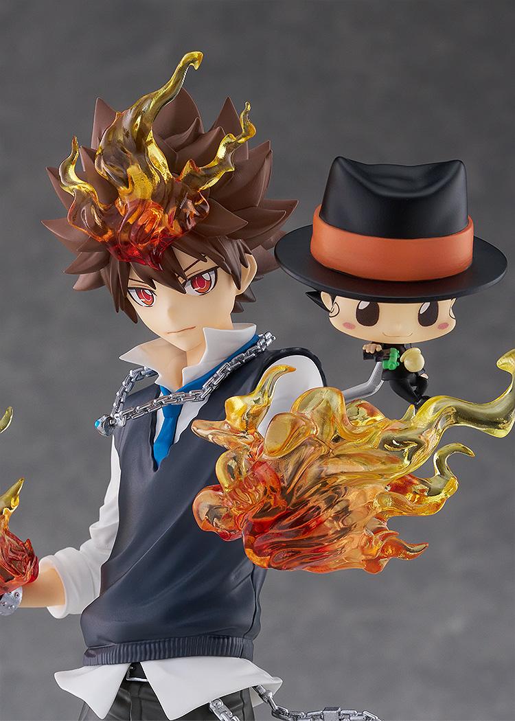 Close-up upper-body shot of Tsunayoshi Sawada with translucent flame effects around his fists, accompanied by Reborn wearing his fedora hat.