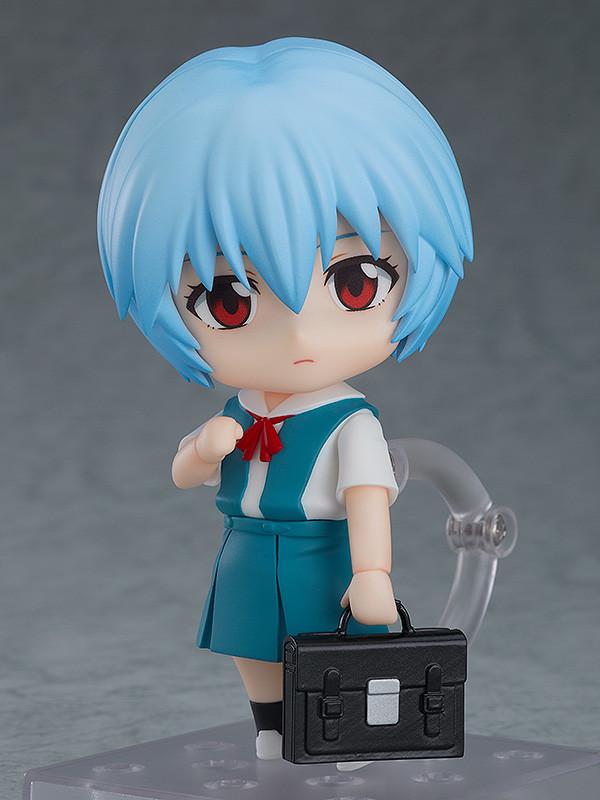 Rebuild of Evangelion Rei Ayanami Nendoroid figure standing on a clear display stand with a black briefcase