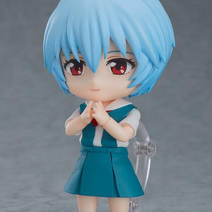 Rei Ayanami Nendoroid figure with a gentle smiling face plate expression and hands clasped together