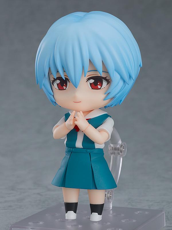 Rei Ayanami Nendoroid figure with a gentle smiling face plate expression and hands clasped together