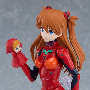 Close-up of the PLAMATEA Asuka Shikinami Langley model kit figure holding her iconic red puppet accessory.
