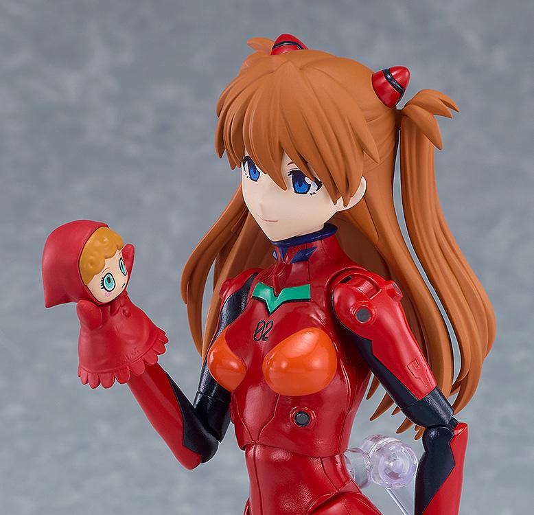 Close-up of the PLAMATEA Asuka Shikinami Langley model kit figure holding her iconic red puppet accessory.