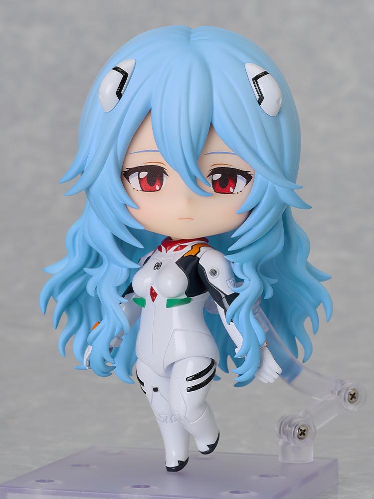 Rei Ayanami Nendoroid with her pondering face plate standing on a clear display base.