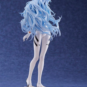 Rear view of the Rei Ayanami figure emphasizing the bold and delicate modeling of her long blue hair blowing in the wind.