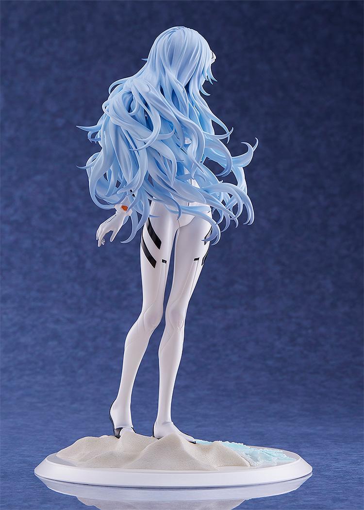 Rear view of the Rei Ayanami figure emphasizing the bold and delicate modeling of her long blue hair blowing in the wind.