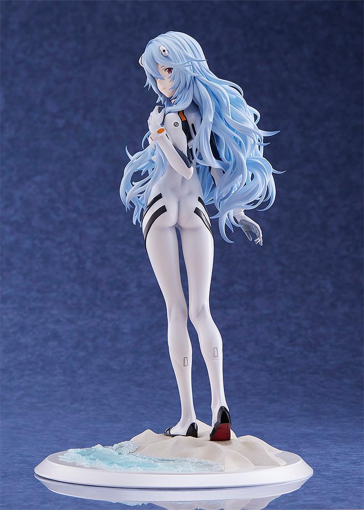 Full front-facing shot of the Rei Ayanami figure on its beach base, capturing the fragile yet content expression of the character.