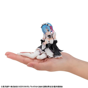 The Melty Princess Rem figure held in a hand to demonstrate its compact 3.54-inch palm-size scale.