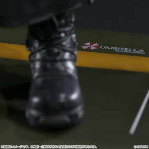 Close-up of the Nemesis figure's boot and the highly detailed display base featuring the Umbrella Corporation logo.