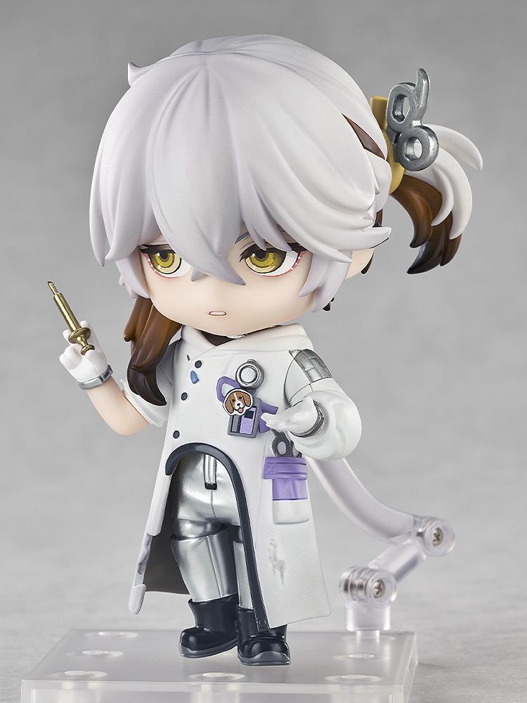 Medicine Pocket Nendoroid figure showing a displeased, serious face plate while holding a small gold syringe accessory.