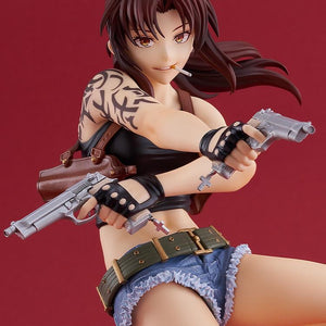 Detailed close-up shot of the Revy figure against a solid red background, focusing on her mischievous grin and reckless confidence.